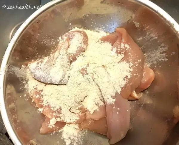Raw chicken washed with flour to remove fresh taste