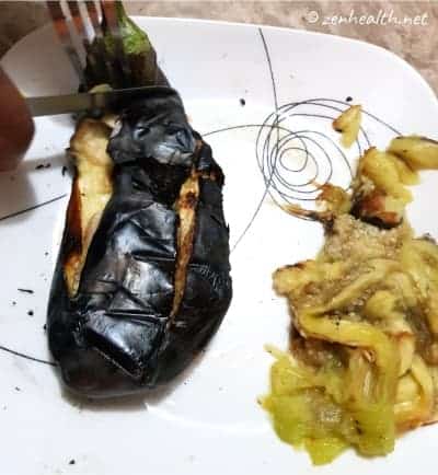 Remove charred skin of eggplant